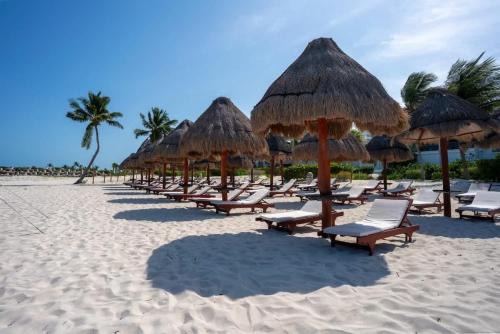Playa Mujeres Apartment | 2BR Beachfront Exclusive Condo w/Top Features