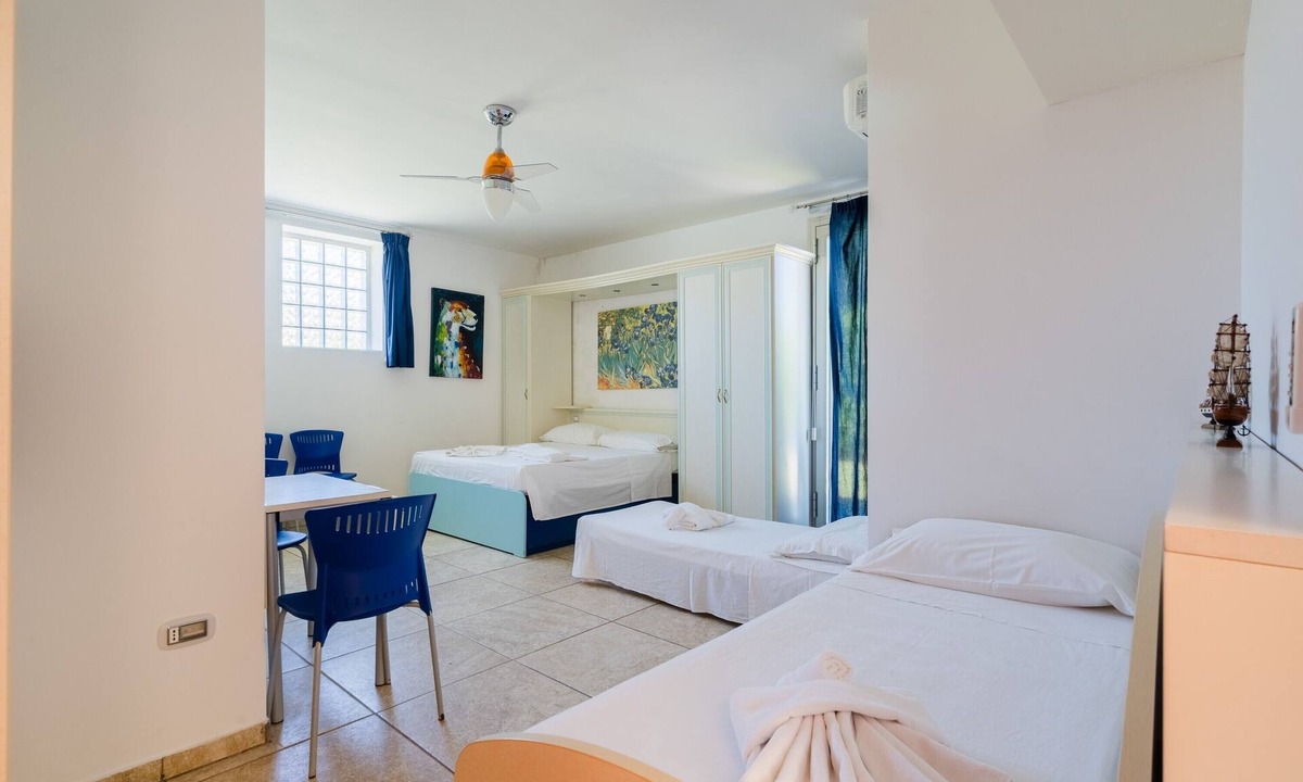 Neviano House | Apartment 'Core Resort - Familiare Bianca' with Shared Pool, Wi-Fi, and Air Conditioning