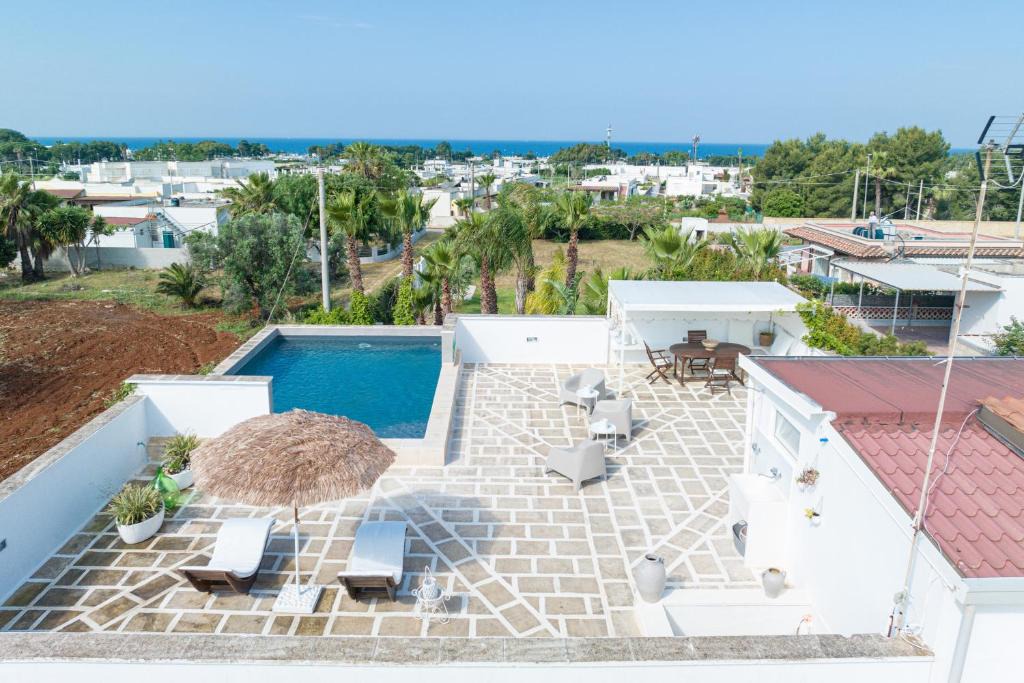 Marina di Mancaversa Apartment | Attico Vinci con piscina