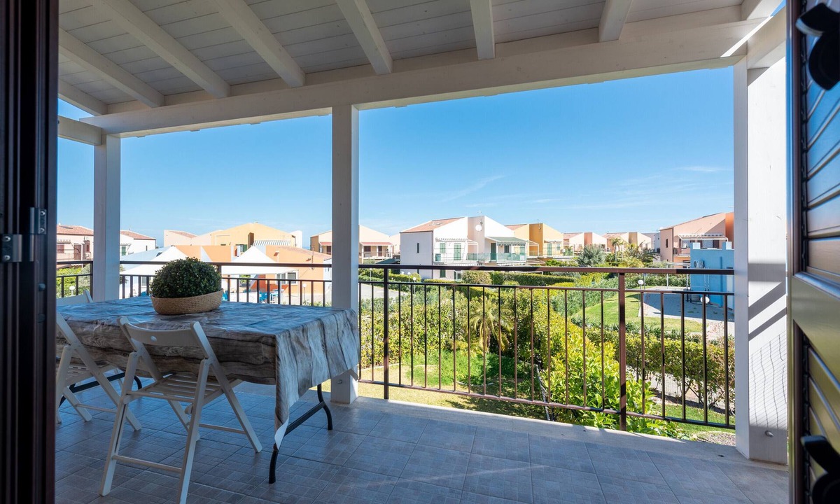 Campofelice di Roccella House | Vacation Home "In Villaggio Centopini" with Shared Pool, 2 Balconies & A/C