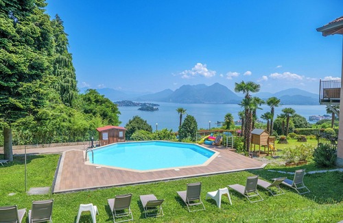 Carciano Apartment | 2-room apartment with terrace and garden in an Art Nouveau villa with communal pool