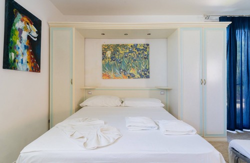 Neviano House | Apartment 'Core Resort - Familiare Bianca' with Shared Pool, Wi-Fi, and Air Conditioning