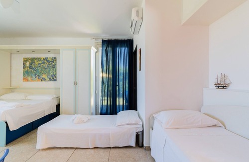 Neviano House | Apartment 'Core Resort - Familiare Bianca' with Shared Pool, Wi-Fi, and Air Conditioning