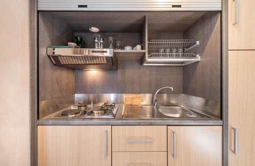 Province of Cagliari Apartment | Apartment Patio Borgo Anninnia with BBQ, Shared Garden & Wi-Fi