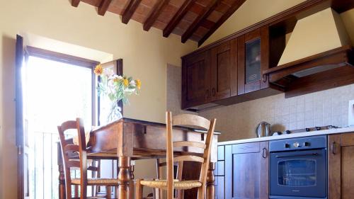 Motina Apartment | Appartamenti con cucina nelle colline toscane