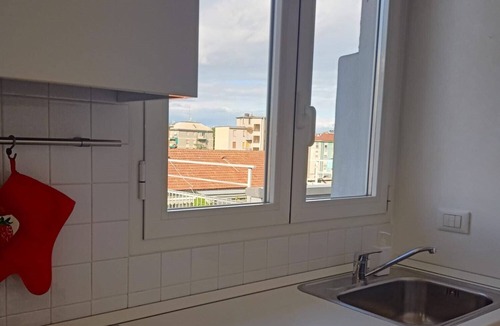 Cagnola Apartment | Bright and modern one-bedroom apartment with terrace.