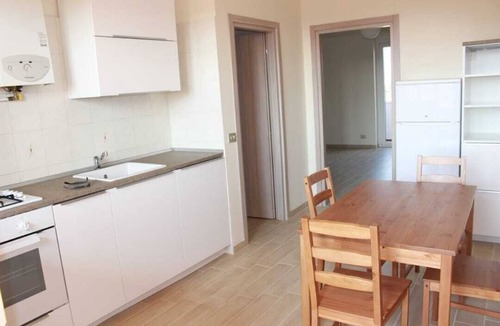 Forze Armate - Sella Nuova Apartment | CHECK-INGANNI, above MM1 Inganni and alongside the Italian Diagnostic Center