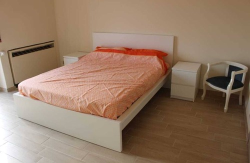 Forze Armate - Sella Nuova Apartment | CHECK-INGANNI, above MM1 Inganni and alongside the Italian Diagnostic Center