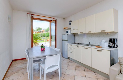 Moniga del Garda Apartment | Flat with balcony, swimming pool and lake view