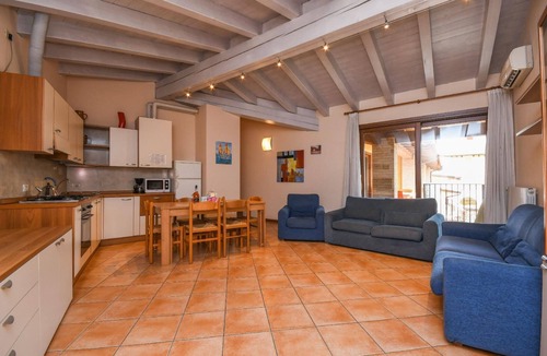 Moniga del Garda Apartment | Flat with balcony, garden and lake view