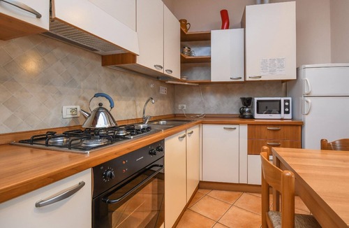 Moniga del Garda Apartment | Flat with balcony, garden and lake view