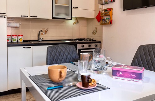 Alghero Apartment | Holiday Home 'Casa 'Sole Del Lido' with Balcony and Air Conditioning