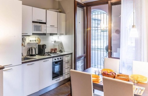 Ticinese Apartment | Prada House: Modern Comfort with Terrace and Parking in Milan
