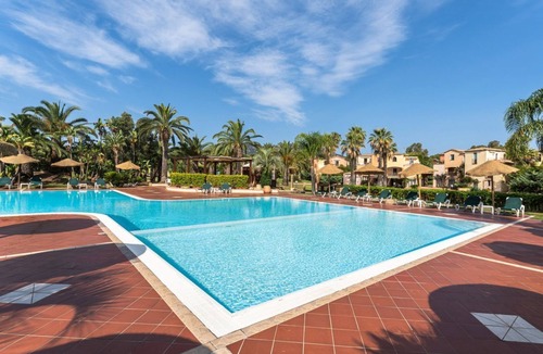 Santa Margherita di Pula Apartment | Studio apartment 2 beds, (20/25 mq): living room with kitchenette, table fridge and double or double bed, bathroom. All studios are located on the ground floor. All the flats have a view of the park. The apartments are equipped with: <b