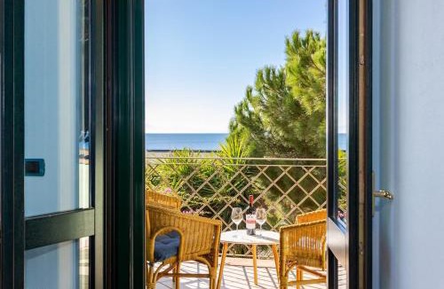 Torre Grande Apartment | Villa Ray - Front row beachfront with garden