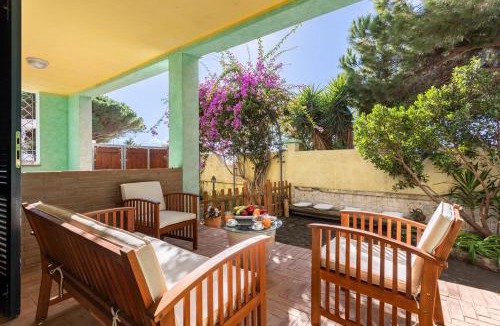 Torre Grande Apartment | Villa Ray - Front row beachfront with garden