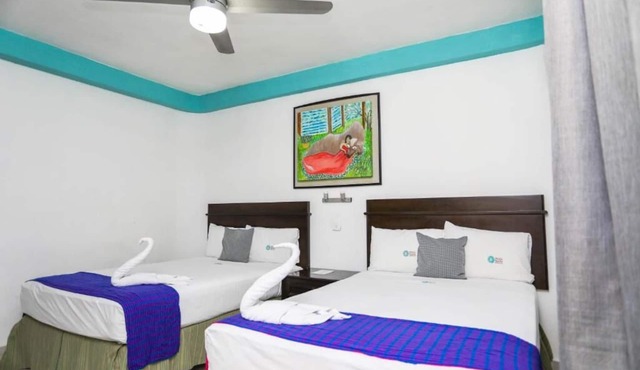 4 Rooms w/2 Double Beds Each + Free Parking | Explore Cancún's Attractions!