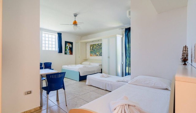Apartment 'Core Resort - Familiare Bianca' with Shared Pool, Wi-Fi, and Air Conditioning