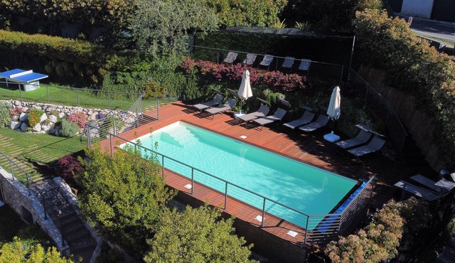 Apartment with garden, heated pool, Wifi, indoor parking