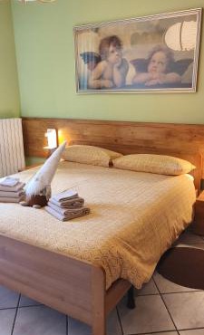 Bernina Express Apartment Il cuore di Lara e Stefy right in front of the train station, with garden and free parking