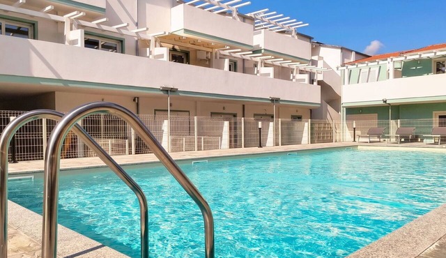 Cosy apartment for 4 people with A/C, WIFI, pool, TV and terrace