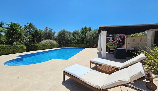 Delightful villa with pool in landscaped gardens. 10% off remaining dates.