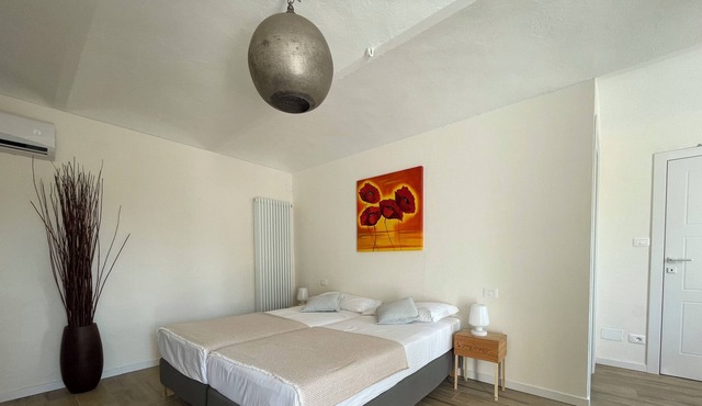 Kick back and Relax amidst the Vineyards in this Deluxe Room @ Tenuta dei Vicini