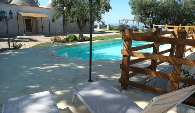 Panoramic trulli for 7 people in the hills with exclusive swimming pool 8 km from the sea