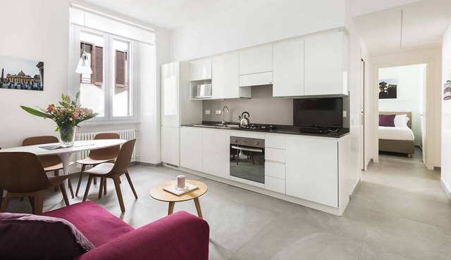 The apartment is located on the 1st floor (with elevator) of a residential building built in the 19th century in Via Marche. It was completely renovated in 2018 using high-quality materials. The design is minimalist and modern. The interior design vers