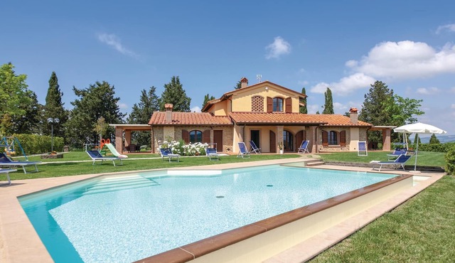 This charming vacation home with private pool is situated in a splendid panoramic position on a hill