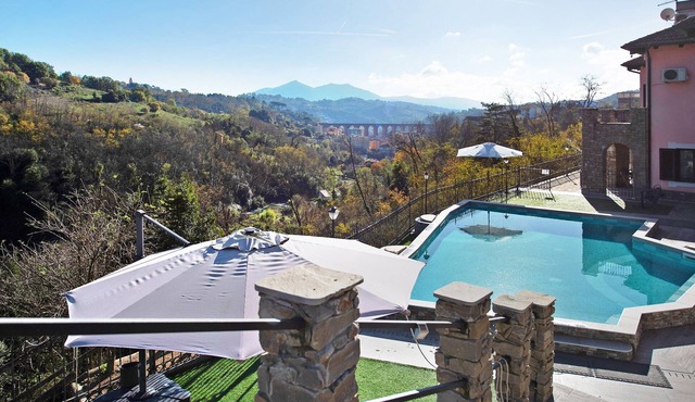 Vacation Home "Baia Di Campo" with Shared Pool, Private Garden, and Wi-Fi